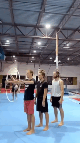 Just some guys jumping through a hoop