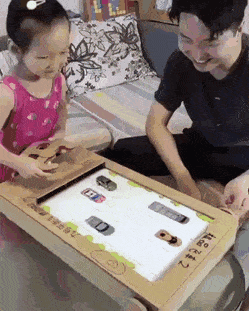 A game a father made for his daughter completely out of cardboard