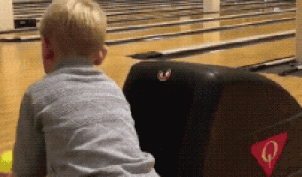 Boy playing bowling