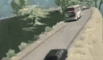 Turning bus on cliff