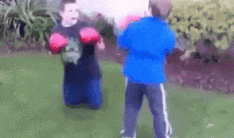 Brothers practicing boxing